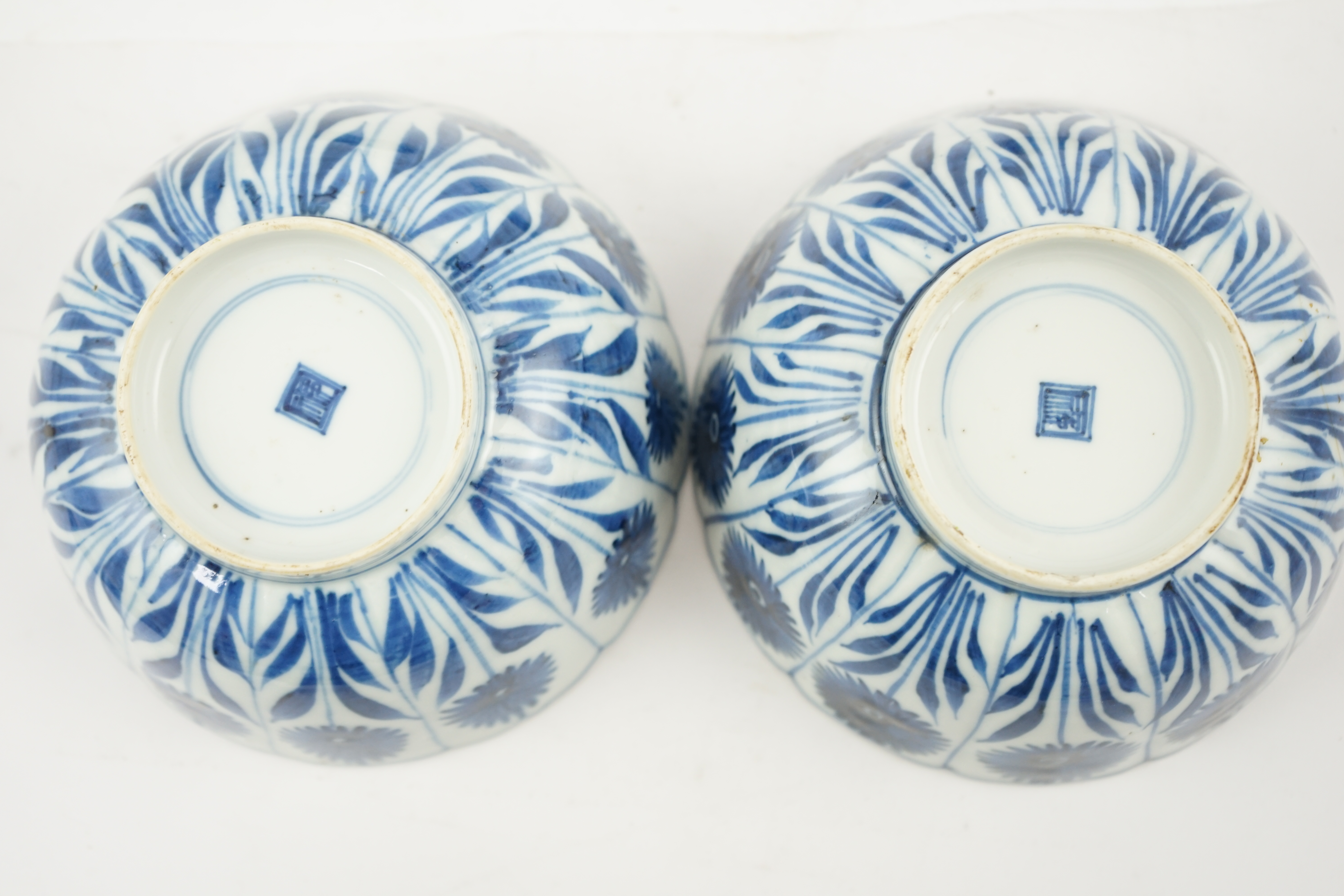 A pair of Chinese blue and white ‘Astor’ bowls, Kangxi period